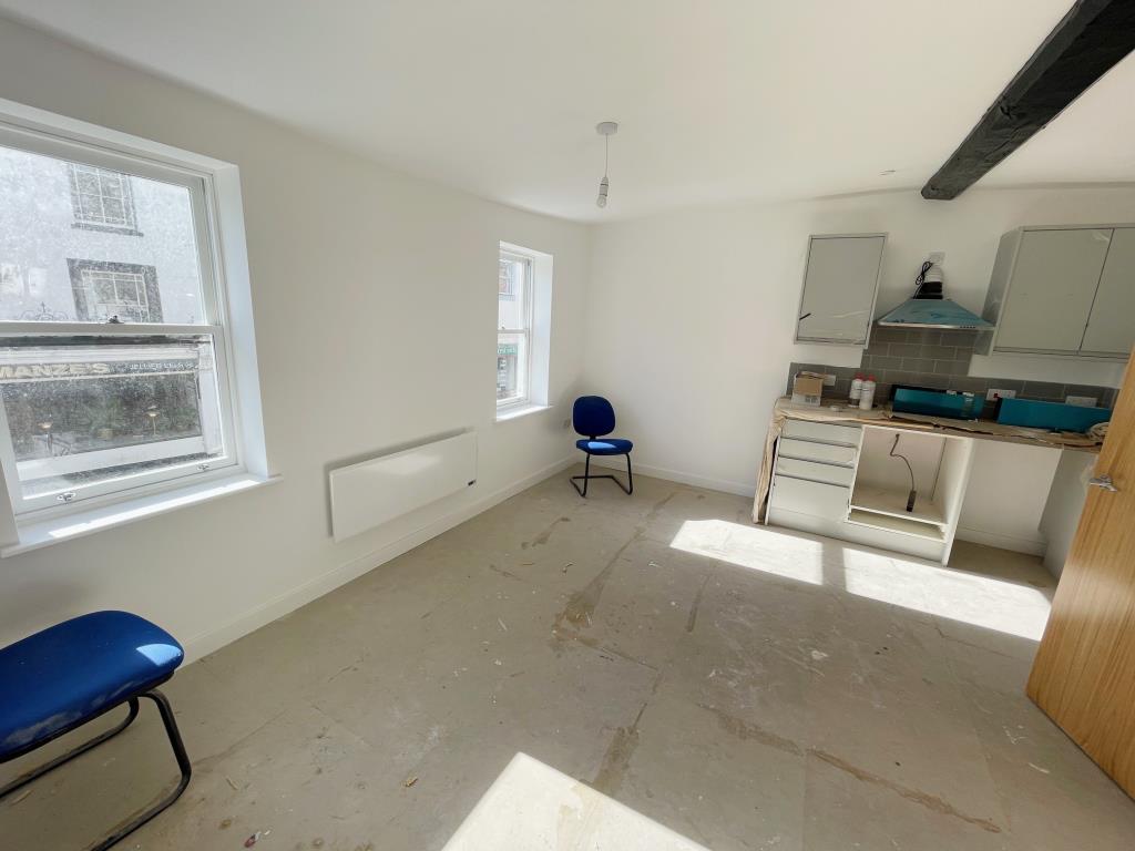 Lot: 161 - VACANT COMMERCIAL PREMISE WITH TWO FLATS ABOVE FOR COMPLETION - Flat A first floor living room/kitchen